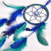 Handmade premium metal dreamcatcher wall art, featuring feathers and intricate beadwork, showcasing Native American culture as decorative art piece